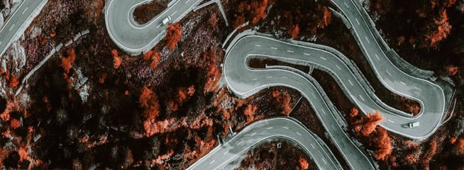 Zigzag road captured from a drone above